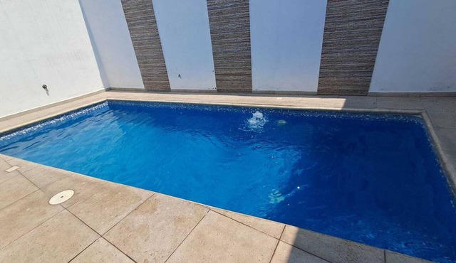Charming 3-bedroom house in Cocoyoc, with 3 bathrooms, AC ,pool, grill
