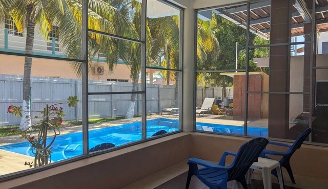 Cozy Poolside Retreat| AC, WiFi & Near Beach