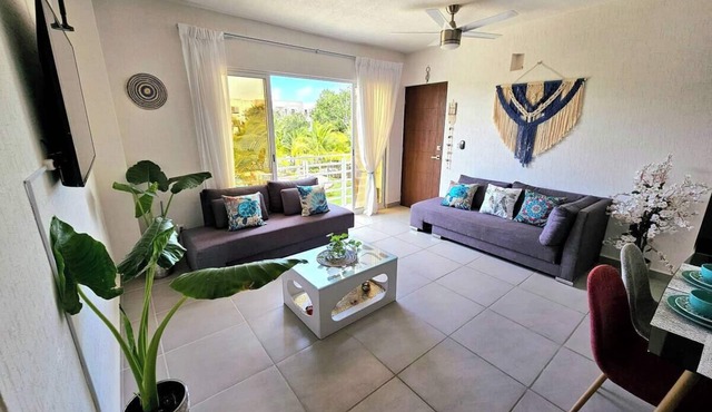Dept. Bohemian in front of the pool, luxury amenities