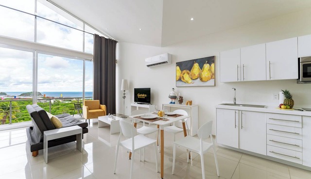High Ceiling Oceanview Studio | Pool & Beach