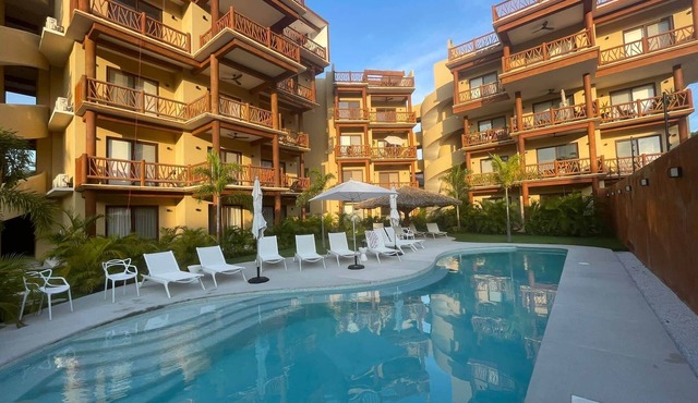 Luxurious 2 bedroom condo Steps from Beach with ocean view from balcony.
