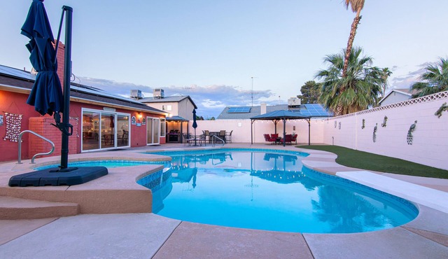 Private Pool & Hot Tub 4BR Home 10 min from the Strip. Sleeps 10