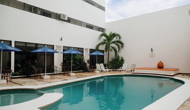 Relax at a Poolside Hotel in Mérida’s Centro District Near Dining & Local Market