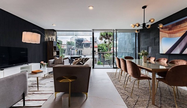 Urban Elegance Apartment with Balcony Views