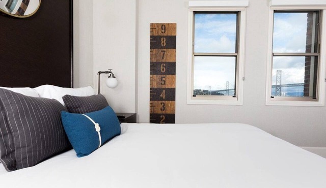Waterfront Queen Room w/Bay & Treasure Island Views | Breakfast & YMCA Access