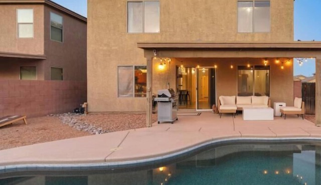 Welcome to Cactus Retreat—a modern 5BR/3BA getaway featuring a private pool, fire pit, grill, and dedicated office. Unwind in a comfortable king-bed primary suite and enjoy spacious living for families and groups. Pet‑friendly.