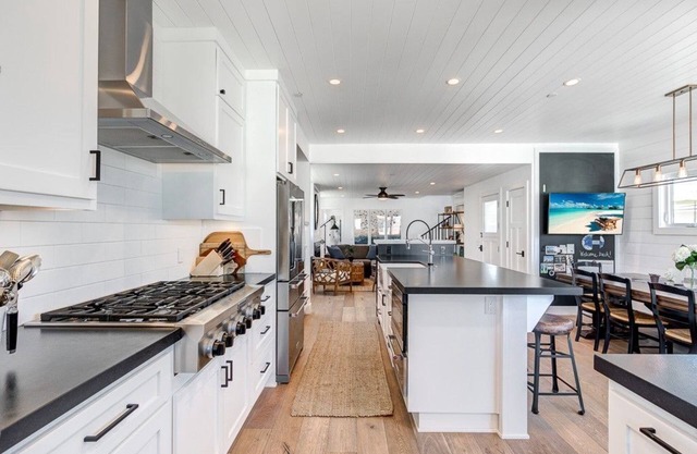 Stunning Tri-Level Home with Rooftop Deck and Outdoor Fireplace