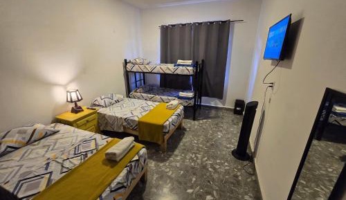 Quadruple Room with Shared Bathroom