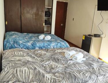 Quadruple Room with Private Bathroom