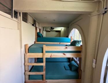 Single Bed in Dormitory Room