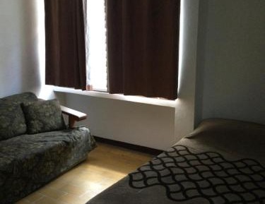Standard Double Room with Shared Bathroom