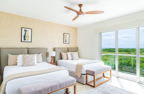 Puerto Juarez Condo | Experience modern luxury in this fully renovated Ocean View Penthouse
