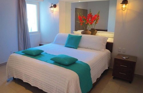 Emiliano Zapata Condo | Enjoy beach, pool and jacuzzi in Romantic Zone