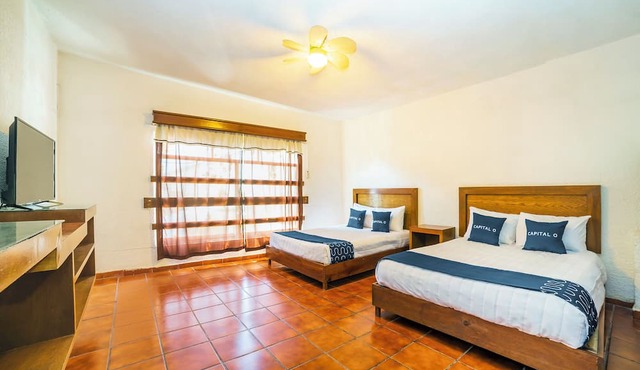 Capital O Hotel Casa Blanca