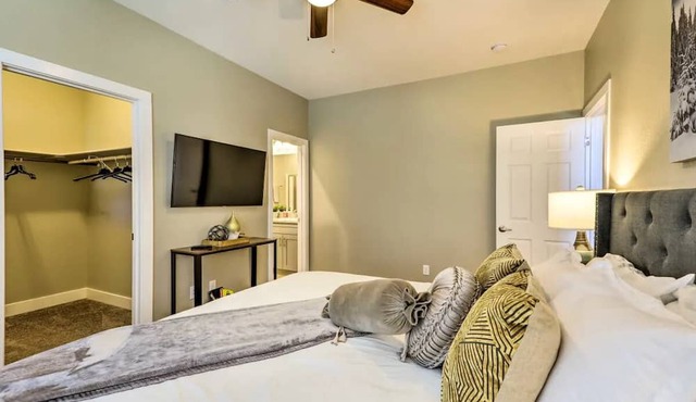 Family friendly 4 bedroom townhome with attached 2 car garage & summertime A/C!