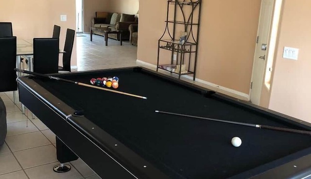 FAMILY FUN spacious 4 bedroom home with pool/spa, bbq, game room & 8 beds