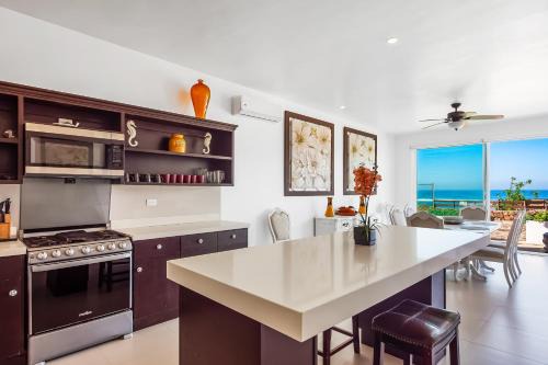 Airy, Beach-View Dog-Friendly Villa with Patio, Outdoor Pool, Streaming, AC