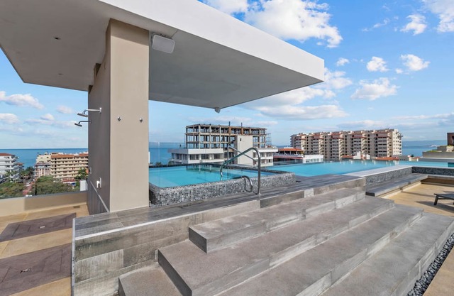 Dedicated workspace, Pool, Gym | Romantic Zone 2BR